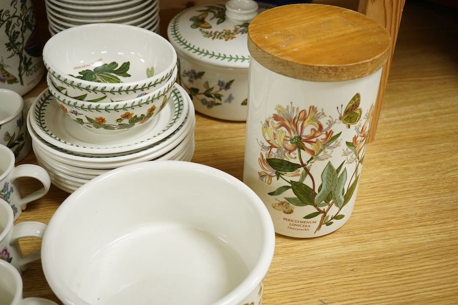 A quantity of Portmeirion tableware to include oval dishes, cups, saucers and dinner plates. Condition - mostly fair, some cracks